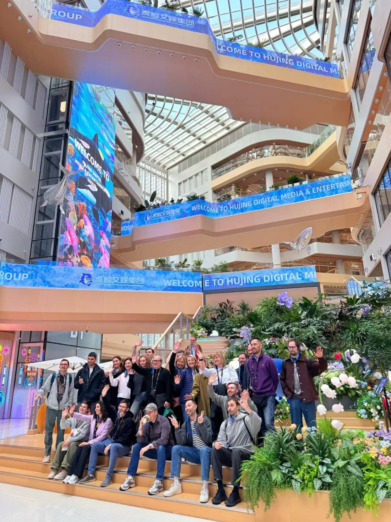 The delegation poses for a group photograph at the host company in Beijing